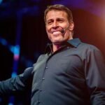 How did Tony Robbins become a millionaire?