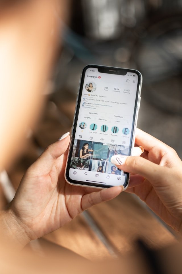Smartphone screen showing Instagram stories with a privacy shield icon overlay